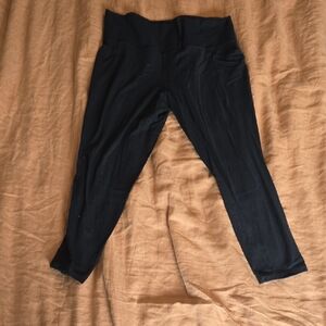 Athleta Black Salutation Stash Pocket II 7/8 Tight